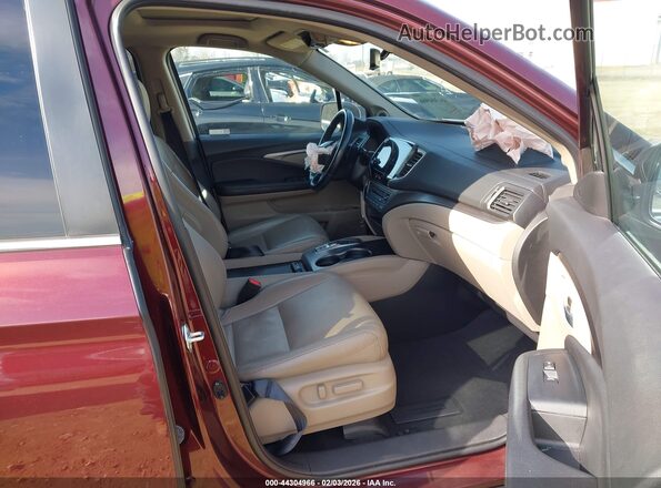 5FNYF5H5XMB039670 2021 HONDA PILOT Красный Вид салона спереди