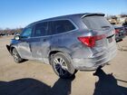 2017 Honda Pilot Exl Серый vin: 5FNYF6H59HB100583