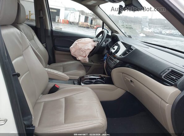 5FNYF6H96KB062370 2019 HONDA PILOT Белый Вид салона спереди