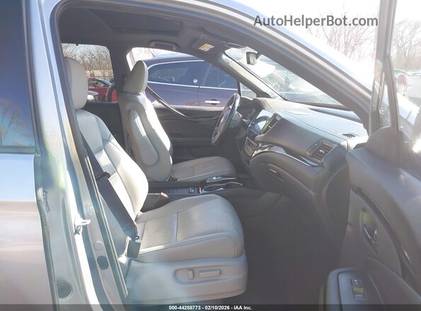 5FNYF8H01PB035680 2023 HONDA PASSPORT Серебряный Вид салона спереди