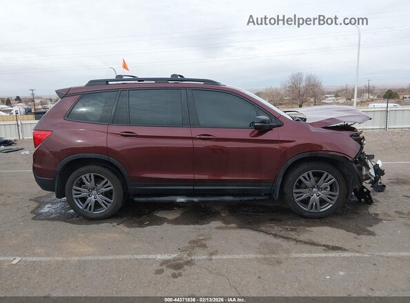 5FNYF8H56MB041935 2021 HONDA PASSPORT Red Widok wnętrza z tyłu