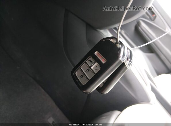 5FNYF8H58PB035557 2023 HONDA PASSPORT White Առջևի վահանակի տեսք