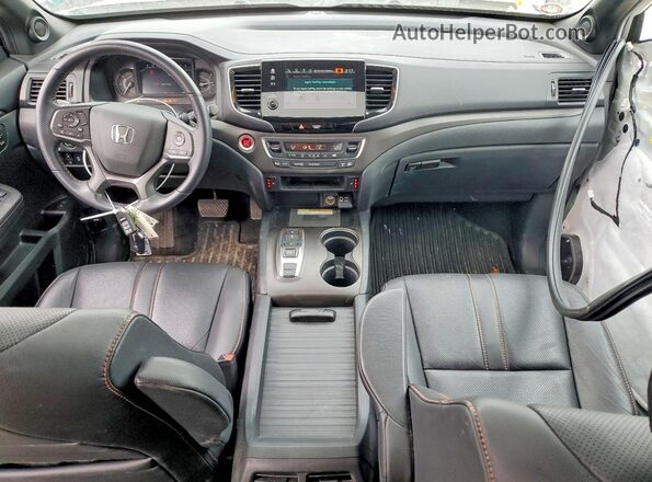 5FNYF8H64PB044281 2023 HONDA PASSPORT Белый Вид панели приборов