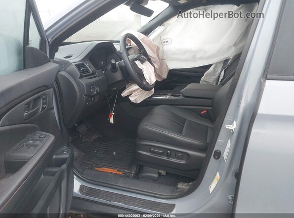 5FNYF8H64SB000094 2025 HONDA PASSPORT Light Blue Вид салона спереди