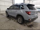 2023 Honda Passport Awd Trailsport Light Blue vin: 5FNYF8H67PB032321