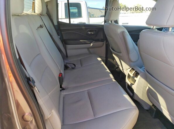 5FPYK2F68KB002482 2019 HONDA RIDGELINE Gray Widok tylnych siedzeń