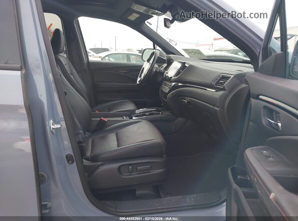 5FPYK3F83PB036912 2023 HONDA RIDGELINE Синий Вид салона спереди