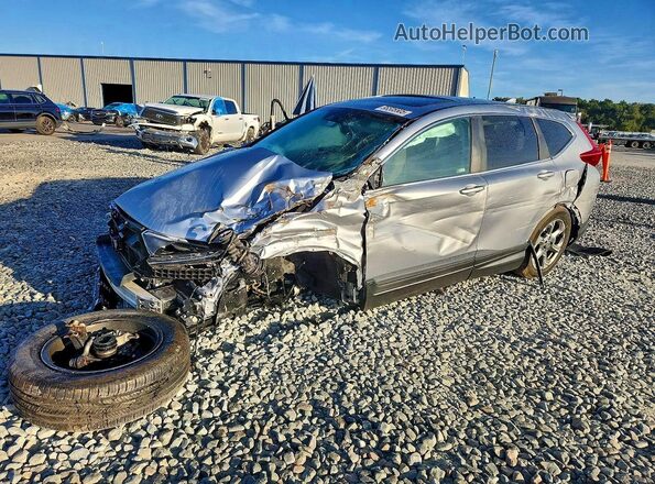 5J6RW1H86KA023117 2019 HONDA CRV Серебряный Передняя левая четверть