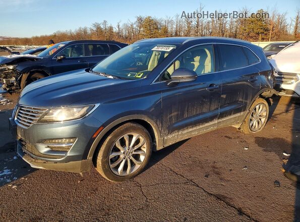 5LMCJ2D91JUL22146 2018 LINCOLN MKC Синий Передняя левая четверть