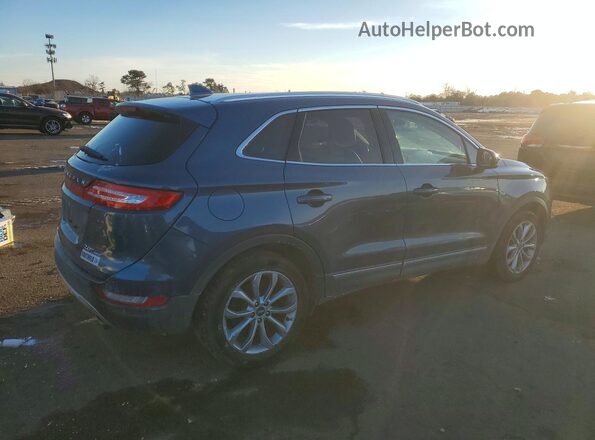 5LMCJ2D91JUL22146 2018 LINCOLN MKC Синий Задняя правая четверть