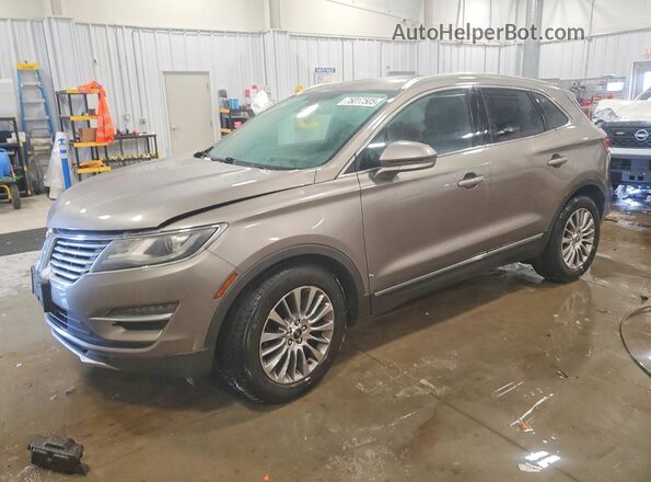 5LMCJ3D92GUJ12654 2016 LINCOLN MKC Желто-коричневый Передняя левая четверть