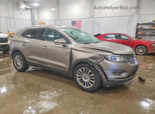 5LMCJ3D92GUJ12654 2016 LINCOLN MKC Желто-коричневый Передняя правая четверть