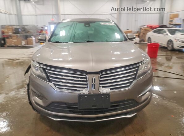 5LMCJ3D92GUJ12654 2016 LINCOLN MKC Желто-коричневый Вид спереди