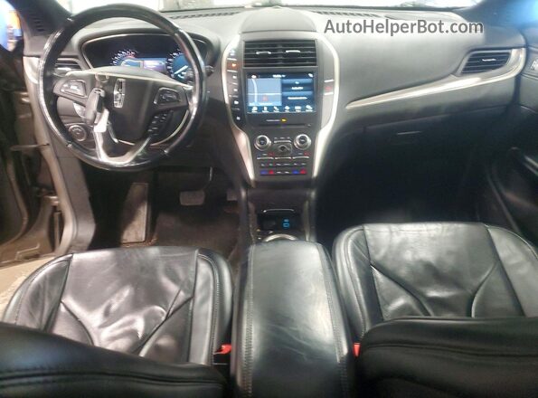 5LMCJ3D92GUJ12654 2016 LINCOLN MKC Желто-коричневый Вид панели приборов
