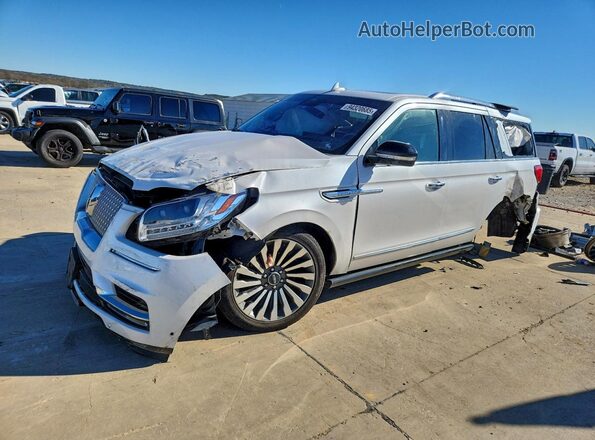 5LMJJ2LT0KEL17455 2019 LINCOLN NAVIGATOR Белый Передняя левая четверть