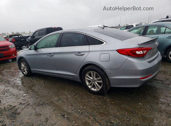 5NPE24AF6HH506103 2017 HYUNDAI SONATA Gray Trasero izquierdo