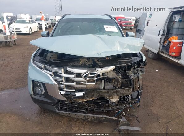 5NTJDDAF2NH003707 2022 HYUNDAI SANTA CRUZ Light Blue Вид задней части салона