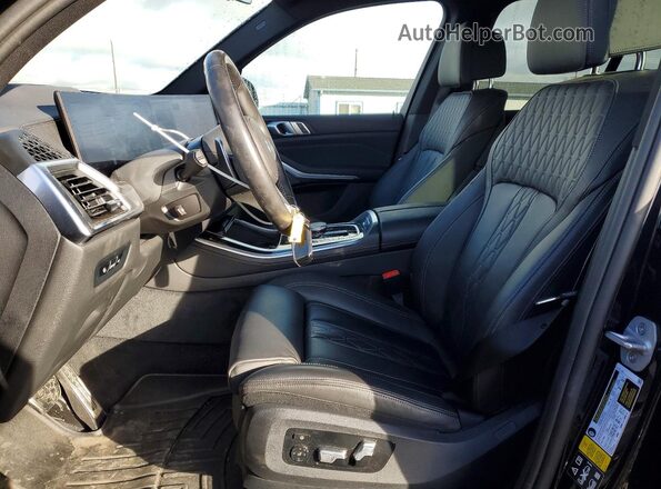 5UX23EU02R9U13343 2024 BMW X5 Синий Вид салона спереди