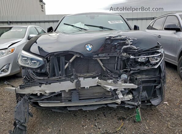 5UX2V5C07M9G28627 2021 BMW X4 Black Widok z przodu