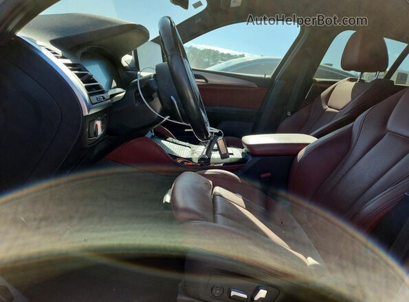 5UX33DT00N9M13481 2022 BMW X4 Серый Вид салона спереди