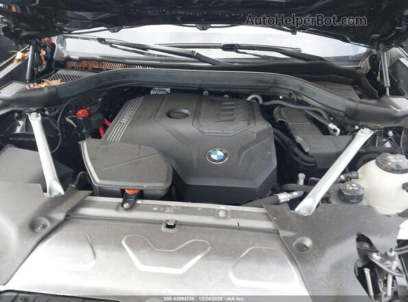 5UX33DT0XS9Y22874 2025 BMW X4 Черный Вид сзади