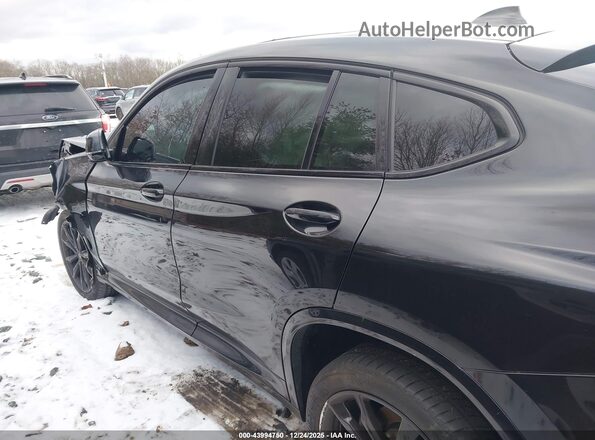 5UX33DT0XS9Y22874 2025 BMW X4 Черный Вид задней части салона