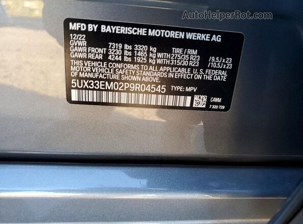 5UX33EM02P9R04545 2023 BMW X7 Charcoal Widok naklejki z numerem VIN