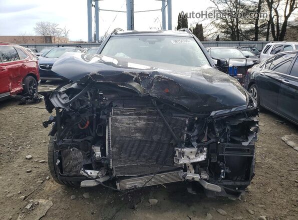 5UX33EM07P9P47434 2023 BMW X7 Black Front view