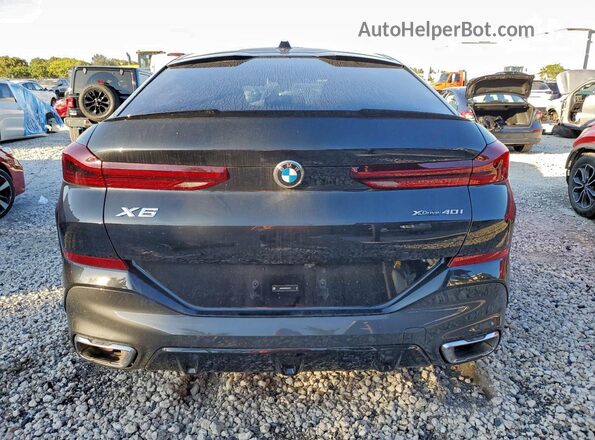 5UX33EX01R9V05379 2024 BMW X6 Черный Вид сзади