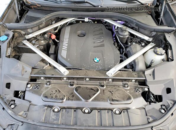 5UX33EX06R9S66847 2024 BMW X6 Black Vista del compartimento del motor
