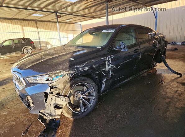 5UX33EX08S9W74479 2025 BMW X6 Черный Передняя левая четверть