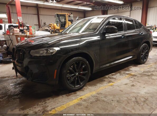 5UX43DT01N9K09437 2022 BMW X4 Black Vista tres cuartos delantera izquierda