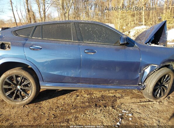 5UXCY6C02N9J92799 2022 BMW X6 Blue Widok wnętrza z tyłu