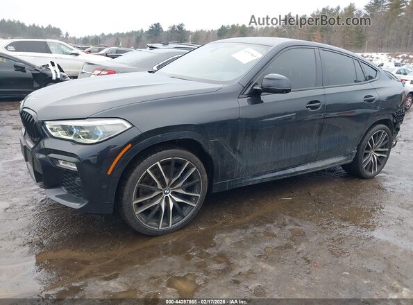 5UXCY8C01L9B63080 2020 BMW X6 Black Vista tres cuartos delantera izquierda