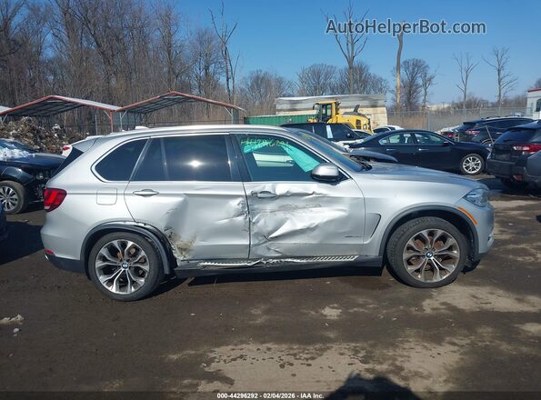 5UXKR0C5XG0S90150 2016 BMW X5 Серебряный Вид задней части салона