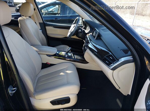 5UXKR2C53G0R68703 2016 BMW X5 Черный Вид салона спереди