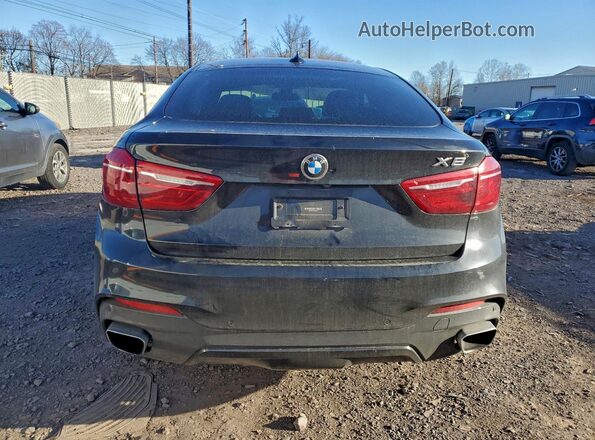 5UXKU2C50K0Z64597 2019 BMW X6 Черный Вид сзади