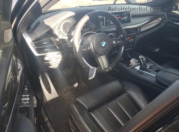 5UXKU6C5XJ0Z66752 2018 BMW X6 Черный Вид панели приборов