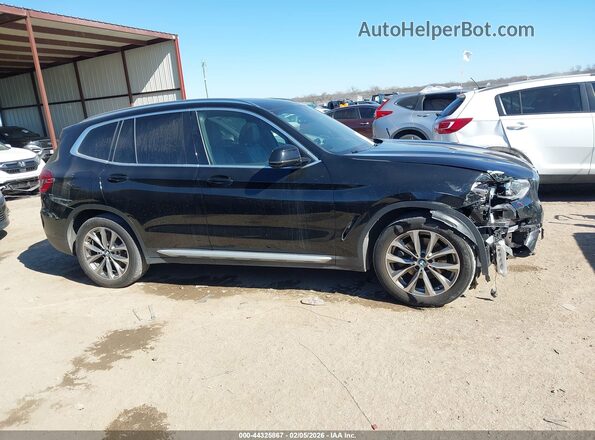 5UXTR7C50KLR45372 2019 BMW X3 Черный Вид задней части салона