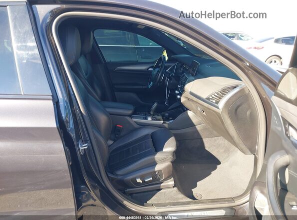 5UXUJ5C59K9A33100 2019 BMW X4 Черный Вид салона спереди