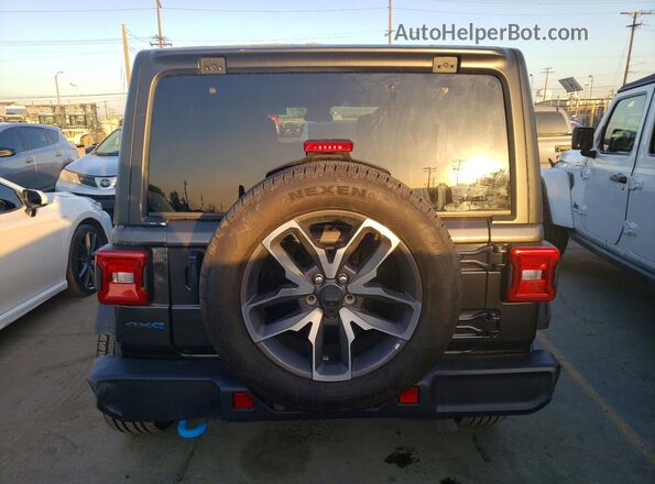 1C4RJXN63RW356172 2024 JEEP WRANGLER Серый Вид салона спереди