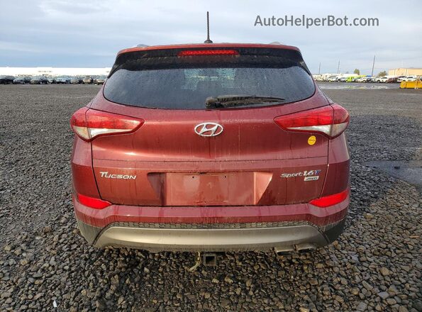 KM8J3CA25GU196254 2016 HYUNDAI TUCSON Red Widok wnętrza z przodu
