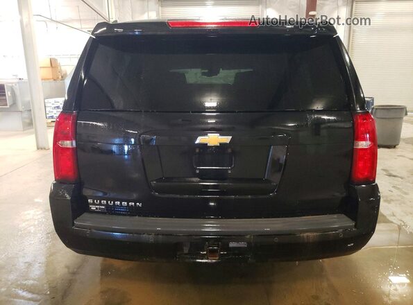 1GNSKHKC9JR119419 2018 CHEVROLET SUBURBAN Черный Вид салона спереди