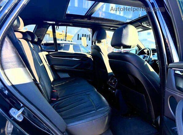 5UXKT0C56J0V99901 2018 BMW X5 Черный Вид панели приборов