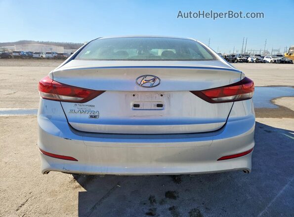 KMHD74LFXJU646141 2018 HYUNDAI ELANTRA Серебряный Вид салона спереди
