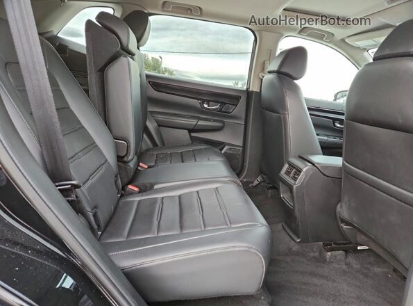 7FARS4H78PE016344 2023 HONDA CRV Black Vista interior trasera
