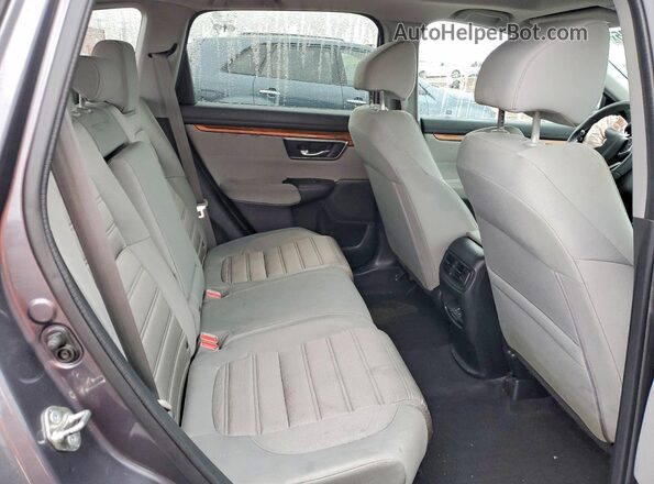 7FARW2H52JE006052 2018 HONDA CRV Gray Widok tylnych siedzeń