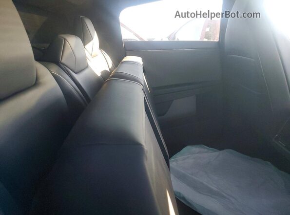 7G2CEHED0SA072307 2025 TESLA CYBERTRUCK Silver Rear seats view