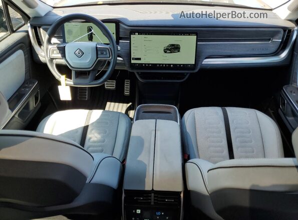 7PDSGABL5PN006593 2023 RIVIAN R1S Черный Вид панели приборов