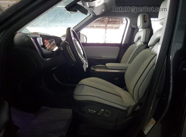 7PDSGCBA8TN079297 2026 RIVIAN R1S Серый Вид салона спереди